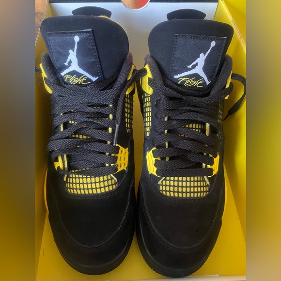 Jordan 4s black and yellow